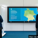 Home 19 토착지식 데이터베이스의 문화적 영향력 - A vibrant digital archive room in a modern German library, showcasing interactive screens displaying...